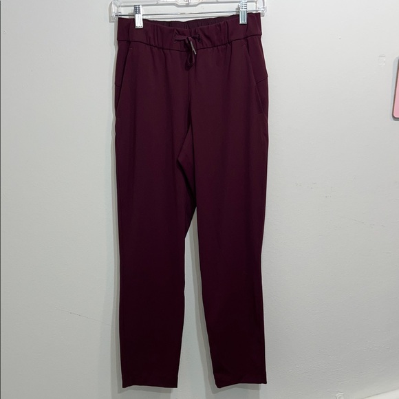 lululemon athletica Lululemon On the Fly 7/8 Pant *28" burgundy garnet cassis - Picture 3 of 8
